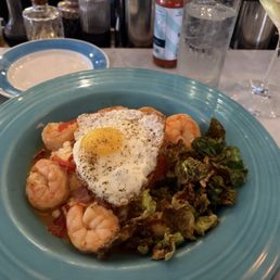 Shrimp and Grits with a fried egg. Shrimp and Grits with a fried egg.