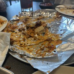 Nachos , almost everything on the side ( as requested ) very good Nachos , almost everything on the side ( as requested ) very good
