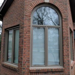 Hoosier Boy Home Improvements - Double casement with half round on top.