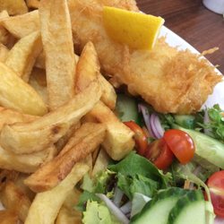 Papa's Fish and Chips - Line caught Halibut, chips and mushy peas.