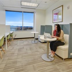 Office Evolution Ann Arbor - Co-working space with desks and chairs or individual study nooks for a little more privacy