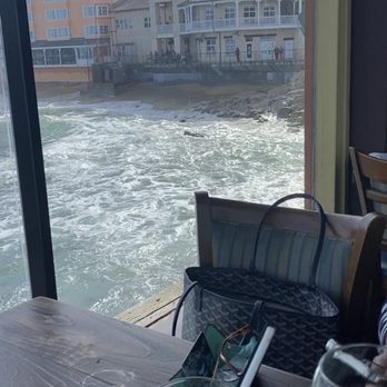 The Fish Hopper - Great table spot at the end with waves - Seafood Near Me - Monterey, California The Fish Hopper - Great table spot at the end with waves - Seafood Near Me - Monterey, California