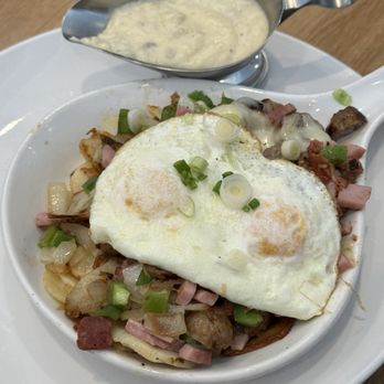 Broken Yolk Cafe - Meat Lover's Skillet with a side of sausage gravy! - Breakfast & Brunch Near Me - Oceanside, California Broken Yolk Cafe - Meat Lover's Skillet with a side of sausage gravy! - Breakfast & Brunch Near Me - Oceanside, California