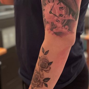 Hot Ink Tattoos & Body Piercing - Upper arm piece done by Brandon, roses done by Austin - Tattoo Near Me - Vallejo, California Hot Ink Tattoos & Body Piercing - Upper arm piece done by Brandon, roses done by Austin - Tattoo Near Me - Vallejo, California