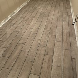 H-M FLOORING - Wood look tile in our master closet space