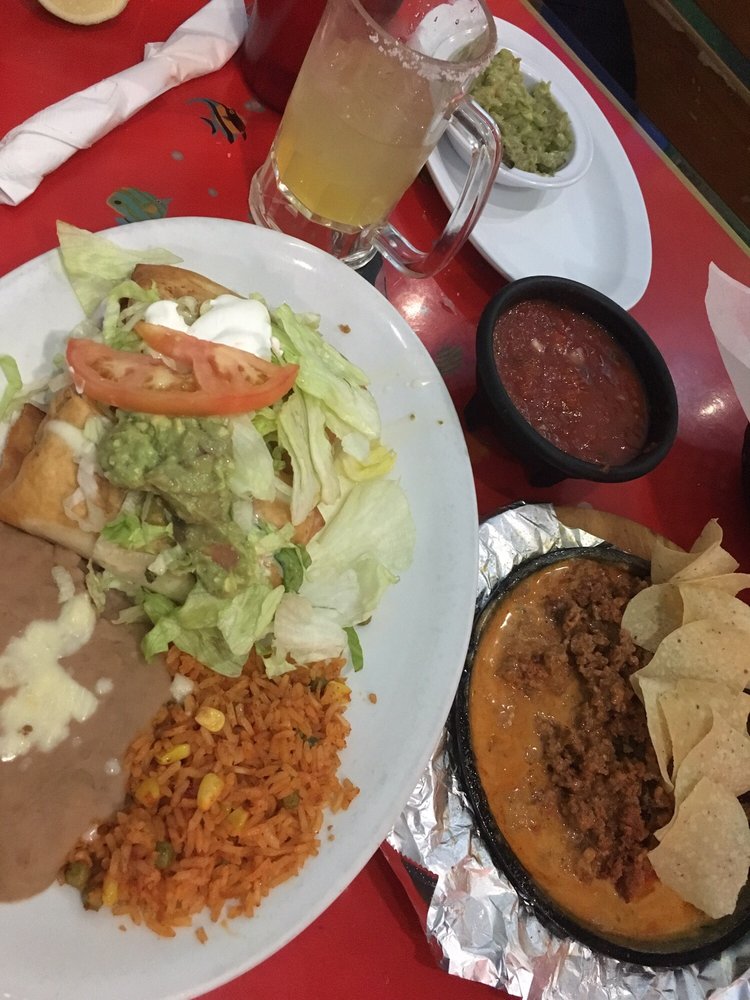 Order Carne Asada Chimichanga food online from Amigo Joe's Mexican Restaurant and Cantina store, St. Louis on bringmethat.com