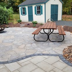Encore Landscaping - New patio,  pavers look like random flagging.
