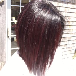 Dark brown hair with red violet highlights