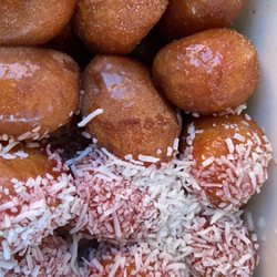 Loukoumania Café - Six original loukoumades. Six with strawberry covered in coconut.