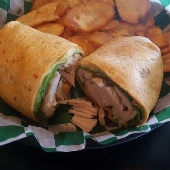 Lebowski's Bar & Grill - Turkey, avocado, hummus, club wrap - American Near Me - Robins, Iowa Lebowski's Bar & Grill - Turkey, avocado, hummus, club wrap - American Near Me - Robins, Iowa