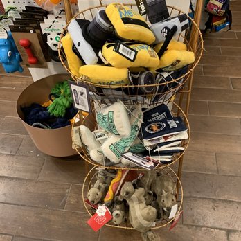 Dog & Co - NYC themed squeaky toys like Metrocard and Statue of Liberty abound - Pet Stores Near Me - New York, New York
