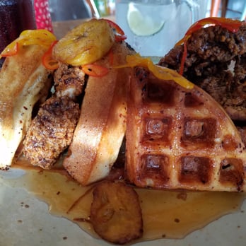 Doce Provisions - Big "Little Bird" fried chicken with plantain waffles, guava jelly and Sriracha honey - New American Near Me - Miami, Florida