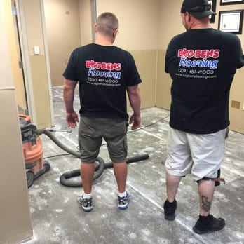 Creative Vision Printing - Shirts by CVP in Stockton being worn while installing the floor in Lodi Costco Optometry center. - Printing Services Near Me - Stockton, California Creative Vision Printing - Shirts by CVP in Stockton being worn while installing the floor in Lodi Costco Optometry center. - Printing Services Near Me - Stockton, California