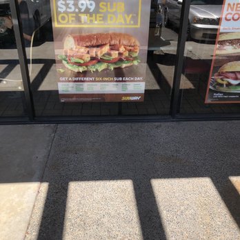 Subway - a sign in the window of a subway sandwich shop - Sandwiches Near Me - Fresno, California