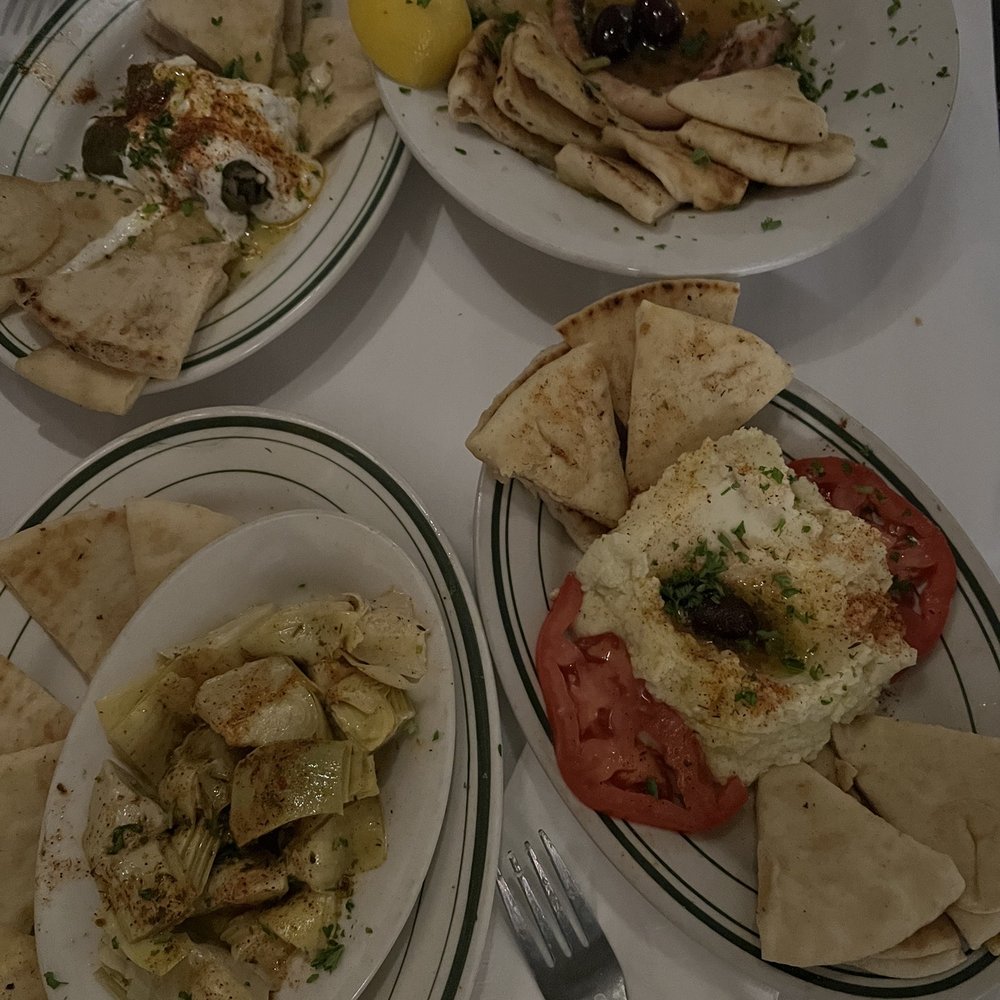 Olympia Cafe - Octopus Marinated Artichoke Hearts Tiropitakia - Greek Near Me - Savannah, Georgia Olympia Cafe - Octopus Marinated Artichoke Hearts Tiropitakia - Greek Near Me - Savannah, Georgia