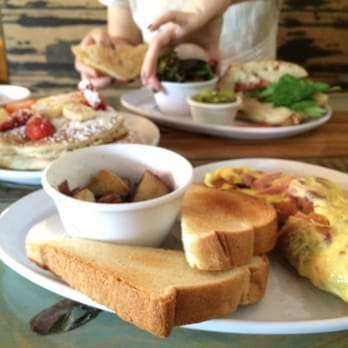 Two Chicks Cafe - The fabulous omelet and pancakes and then in the back my wonderful chicken panini. - Breakfast & Brunch Near Me - New Orleans, Louisiana