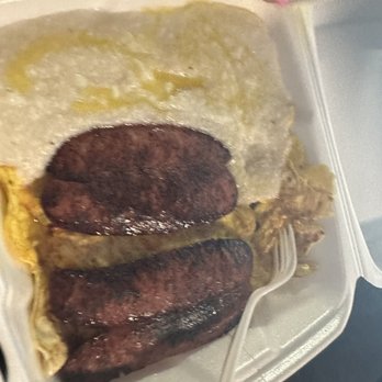 Joe's Grill - a tray of food with a fork in it - New American Near Me - Chicago, Illinois