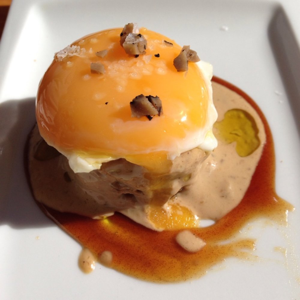Eslava - Slow cooked egg on cake with red wine reduction - Tapas Bars Near Me - Seville, SE Eslava - Slow cooked egg on cake with red wine reduction - Tapas Bars Near Me - Seville, SE