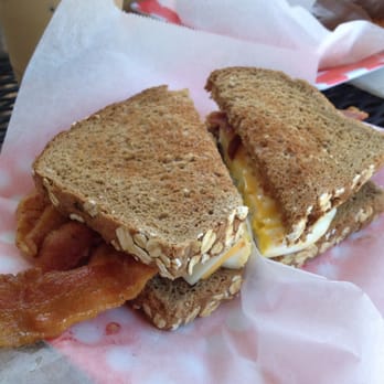 Rose Donuts - Country Breakfast Sandwich - wheat bread, bacon, egg and cheese. - Coffee & Tea Near Me - San Diego, California Rose Donuts - Country Breakfast Sandwich - wheat bread, bacon, egg and cheese. - Coffee & Tea Near Me - San Diego, California