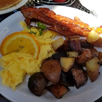 Stacks Pancake House - Firewood bacon and eggs with side of homestyle potatoes .. or something like that! Delicious! - Breakfast & Brunch Near Me - Dana Point, California Stacks Pancake House - Firewood bacon and eggs with side of homestyle potatoes .. or something like that! Delicious! - Breakfast & Brunch Near Me - Dana Point, California