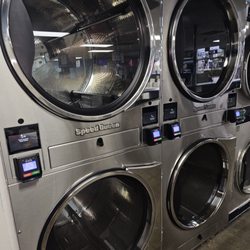 Clean Folks Laundry - New 45 lb dryers. These have a reverse tumbler feature. Your blankets and sheets will thank you.
