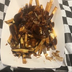 Pub 219 - Poutine is very good ,fries  are bit salty . Fries , gravy , bacon and cheese curds