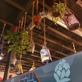 Common Theory - Some trendy hanging decor behind our table - Gastropubs Near Me - San Diego, California