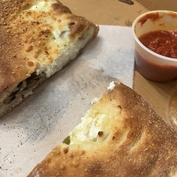 The Crafty Crust - Cheese, mushroom and green pepper calzone...it was delicious! - Bars Near Me - Tequesta, Florida The Crafty Crust - Cheese, mushroom and green pepper calzone...it was delicious! - Bars Near Me - Tequesta, Florida