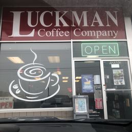 a cup of coffee in the window a cup of coffee in the window