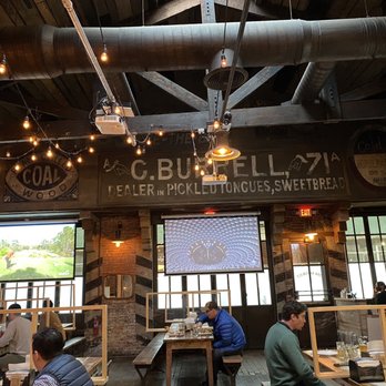 Hudson Hall - people sitting at tables in a restaurant - Beer Bar Near Me - Jersey City, New Jersey Hudson Hall - people sitting at tables in a restaurant - Beer Bar Near Me - Jersey City, New Jersey