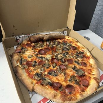 Champion Pizza - Even with a overcooked slice still delicious - Pizza Near Me - Astoria, New York