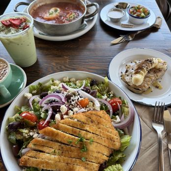 Cafe Smitten - Greek salad, marracoan eggs, almond with banana, cappuccino, and iced strawberry matcha - Coffee & Tea Near Me - Bakersfield, California Cafe Smitten - Greek salad, marracoan eggs, almond with banana, cappuccino, and iced strawberry matcha - Coffee & Tea Near Me - Bakersfield, California