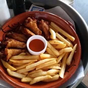 Brayton Ave Cafe - a plate of french fries and dipping sauce - Bars Near Me - Fall River, Massachusetts Brayton Ave Cafe - a plate of french fries and dipping sauce - Bars Near Me - Fall River, Massachusetts