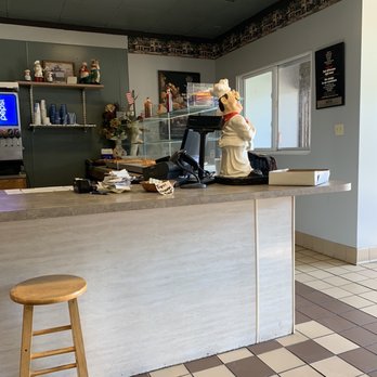 The Boys From Italy - a restaurant counter with a teddy bear - Pizza Near Me - Rome, New York The Boys From Italy - a restaurant counter with a teddy bear - Pizza Near Me - Rome, New York