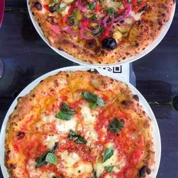 Spark Pizza - Front: Margherita pizza Back: Buffy the Vegetarian Slayer - Pizza Near Me - Redmond, Washington Spark Pizza - Front: Margherita pizza Back: Buffy the Vegetarian Slayer - Pizza Near Me - Redmond, Washington