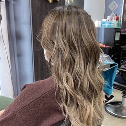 Ash balayage under bright salon light. Ash balayage under bright salon light.