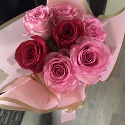 Rose of Sharon Flower Shop - Red and pink roses wrapped in a gorgeous pink with gold trim special tissue paper. Absolutely the most gorgeous roses I've ever seen!