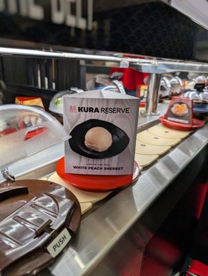 Kura Revolving Sushi Bar by null