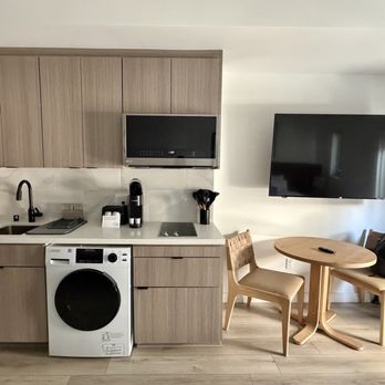Sentral Gaslamp Quarter - Living area with mini-kitchen (full-sized fridge and freezer not shown) - Hotels Near Me - San Diego, California Sentral Gaslamp Quarter - Living area with mini-kitchen (full-sized fridge and freezer not shown) - Hotels Near Me - San Diego, California