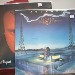 Lost Weekend Records - My latest finds at Lost Weekend. Journey, Phil Collin's and yee haw a little country and the Great American Bar Scene.