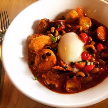 The Revelry - Shrimp and grits with an egg - New American Near Me - Rochester, New York The Revelry - Shrimp and grits with an egg - New American Near Me - Rochester, New York