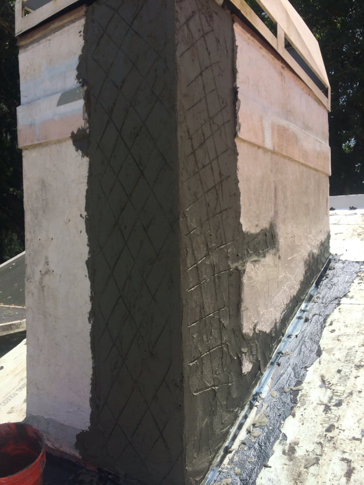 Slide of Sander and Sons Roofing