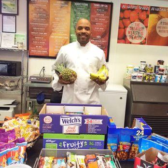 Juiced Up Smoothies & Cafe - a man in a chef's uniform holding a pineapple - Juice Bars & Smoothies Near Me - Laurel, Maryland Juiced Up Smoothies & Cafe - a man in a chef's uniform holding a pineapple - Juice Bars & Smoothies Near Me - Laurel, Maryland