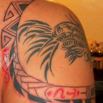 Life Art Creations - filipino tribal rooster back portion - Piercing Near Me - Los Angeles, California Life Art Creations - filipino tribal rooster back portion - Piercing Near Me - Los Angeles, California