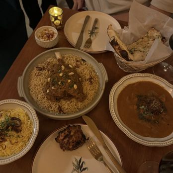 Ishq - Lamb Biryani (left) and Butter Chicken (right) - Indian Near Me - New York, New York Ishq - Lamb Biryani (left) and Butter Chicken (right) - Indian Near Me - New York, New York