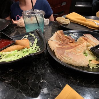 Pineapple Village - Samosas with a hint of curry and sautéed veggies and potstickers, perfect for starters. - Asian Fusion Near Me - Gilroy, California
