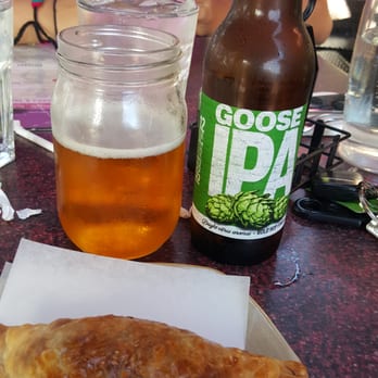 Sergios - Beef and maduro empanada with an IPA - Cuban Near Me - Miami, Florida Sergios - Beef and maduro empanada with an IPA - Cuban Near Me - Miami, Florida