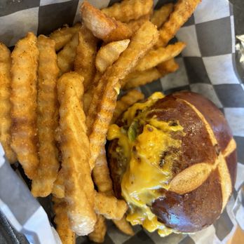 Build My Burgers - Single burger with pretzel bun - New American Near Me - Orlando, Florida Build My Burgers - Single burger with pretzel bun - New American Near Me - Orlando, Florida