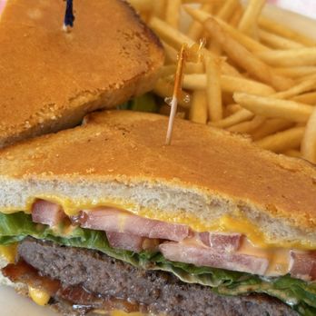 Don's Country Kitchen - FRISCO BURGER ( lb ground beef patty, bacon, cheese, lettuce, tomato and 1000 island dressing on grilled sourdough cheese toast) with fries - Breakfast & Brunch Near Me - Oceanside, California Don's Country Kitchen - FRISCO BURGER ( lb ground beef patty, bacon, cheese, lettuce, tomato and 1000 island dressing on grilled sourdough cheese toast) with fries - Breakfast & Brunch Near Me - Oceanside, California