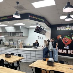 Birrieria Sinaloa - The front of the restaurant inside where you make your order! The menu up top!